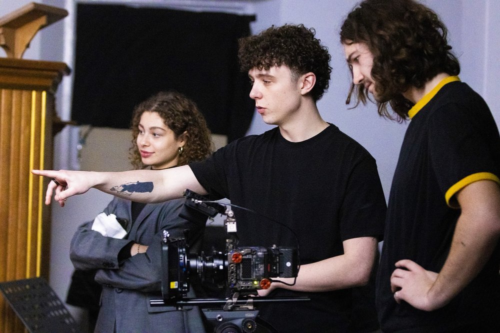 On set, crew setting up a shot